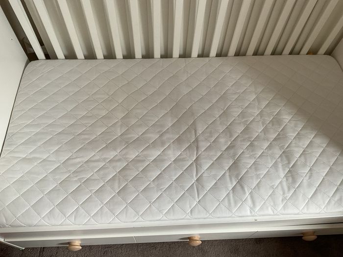 ikea cot bed white , one long drawer ideal for books