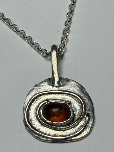 Handmade sterling silver pendant with amber stone