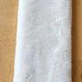 Long Hot Water Bottle with White Fleecy Cover Image 2