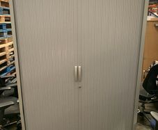 Tambour cabinet