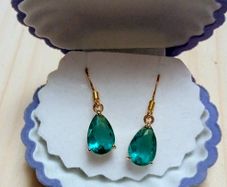 Brand new green teardrop earrings in a shell gift box