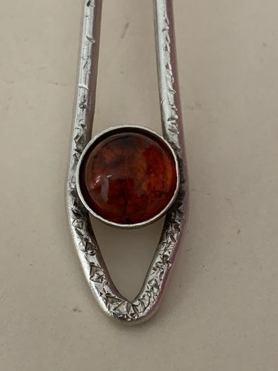 Antique coffee spoon with amber