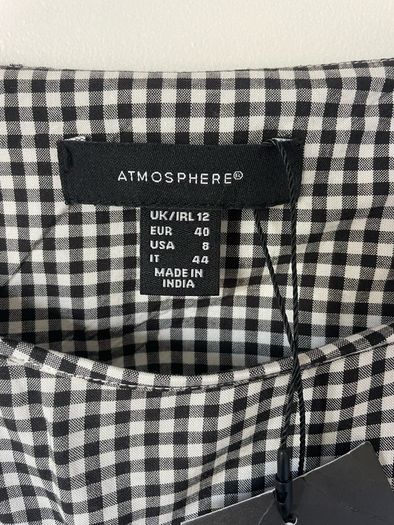 top Bnwt black & white peplum top size 12