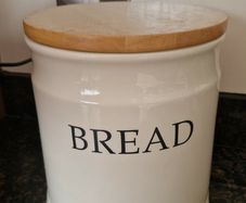 Ceramic bread bin with wooden lid
