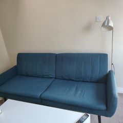 Blue fabric sofa bed