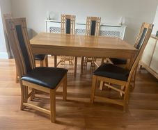 solid oak table and 6 chairs.