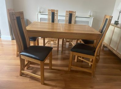 solid oak table and 6 chairs.