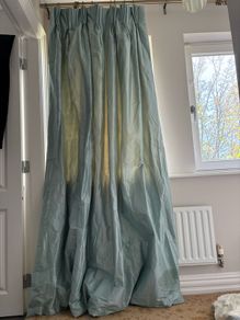 2 blue curtains