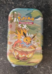 FREE Tracked Shipping. Pokemon Prismatic Evolutions Mini Tin