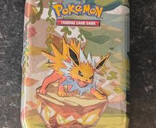 FREE Tracked Shipping. Pokemon Prismatic Evolutions Mini Tin