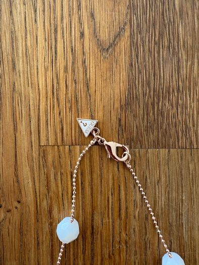Guess 3 piece rose gold and white jewellery set.l