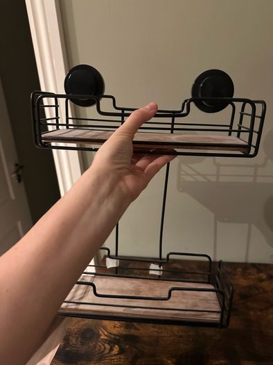 Shampoo bottle holder