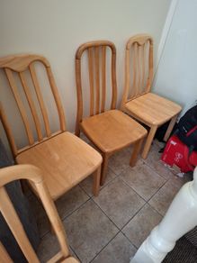 4 kitchen chairs, couch and rug