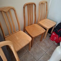 4 kitchen chairs, couch and rug