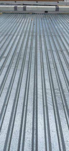 Galvanised metal roof decking