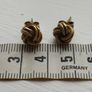 Vintage knot earrings made of 925 sterling silver with gold plating. Image 9