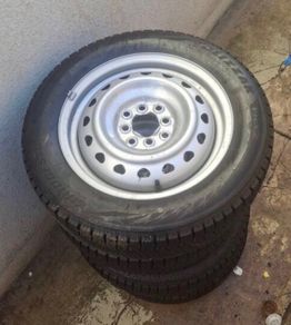 Trailer wheels - 4 new multi-fit Wheels with new BridgeStone tyres.