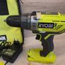 Ryobi Drill + Jigsaw Kit includes a battery and charger Image 2