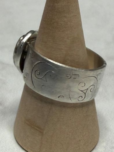 Handmade sterling silver love heart ring with trickles on the wide band. Size R