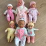 Large Baby Doll Bundle: 6 Dolls, Cot, Car Seat, Highchair, Stroller, & Accessories Image 10