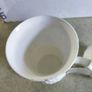 Set of 2 mugs decorative porcelain  fine bone china featuring a distinct textured, quilted or honeycomb base and intricate floral patterns. Image 6