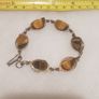 tiger eye bracelet,,good condition,buyer collects or pays postage, thank you, take as is,see pictures for condition Image 8