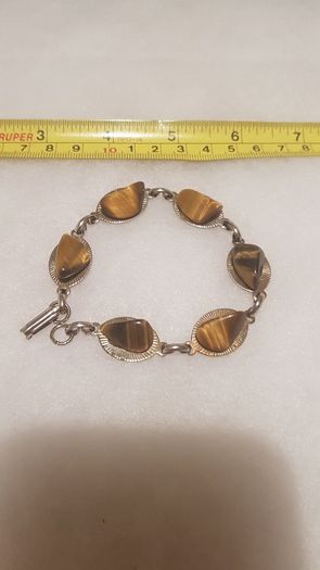 tiger eye bracelet,,good condition,buyer collects or pays postage, thank you, take as is,see pictures for condition