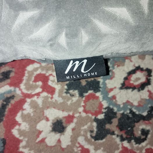 Grey velvet feather filled cushion