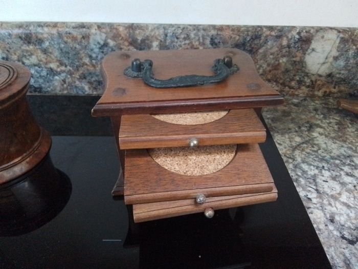 Three sets of Coasters in Containers