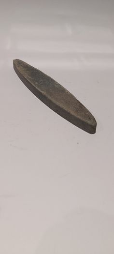 A Canoe Shaped Medium Grit Sharpening Stone