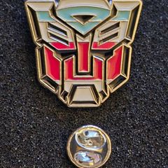 Transformers / autobot, pin back badge.
