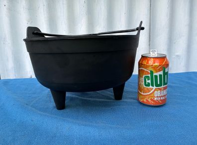 Black plastic flower pot on raiserd legs