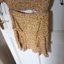 Size 12 Floral set V top and mini skirt Image 8