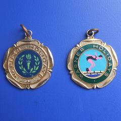 WARNER HOLIDAYS - two holiday camps sports medals (c.1980s)