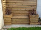 Custom timber garden fencing with integrated planters and bench Image 9