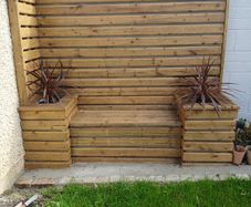 wall cladding with bench and flower boxs