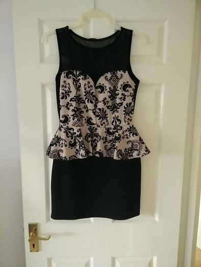 Evita brand Black Dress with Cream Design Peplum