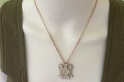 Gold tone sparkling angel pendant chain necklace