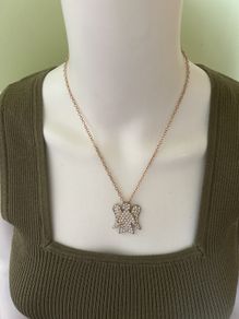 Gold tone sparkling angel pendant chain necklace