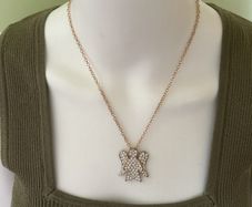 Gold tone sparkling angel pendant chain necklace
