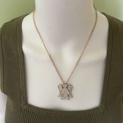 Gold tone sparkling angel pendant chain necklace