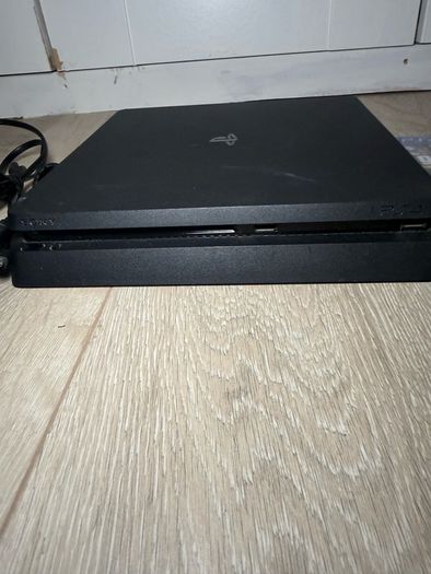 ps4 slim comes 1TB with 3 games all attachments included