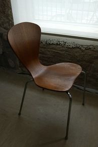 A pair of vintage Danish stackable dining chairs