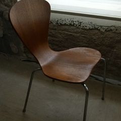 A pair of vintage Danish stackable dining chairs