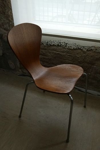 A pair of vintage Danish stackable dining chairs