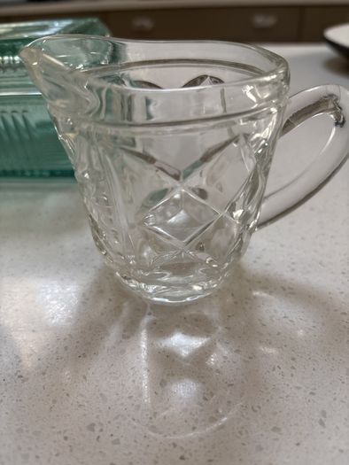 3 pieces of vintage table / dinner ware - A ribbed lidded glass butter dish , vintage 3 footed sugar bowl and cut glass milk jug