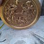 Large Brass Wall Charger Old World Pub Scene, Embossed Tavern scene of 17th-century Pubs. This is a striking brass wall hanging, with an Old World pub scene. It is pressed hammered brass. The raised relief image features a pair of men in Old World dress,  Image 2