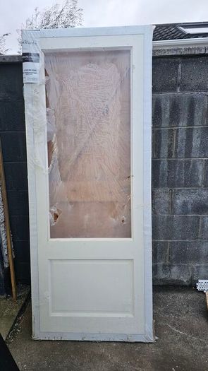 White primed door ,missing glass panel