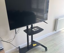Invision Heavy Duty TV Stand on Wheels with wheel locks