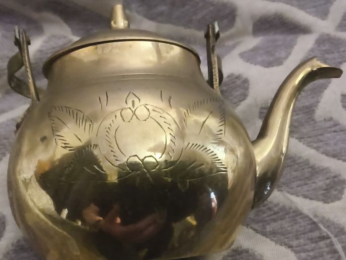 miniature tea-pot and trivet